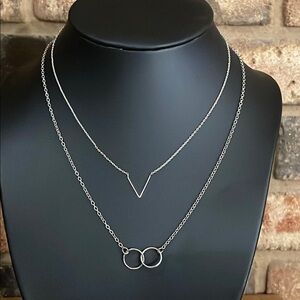 Geometric silver tone layering chains